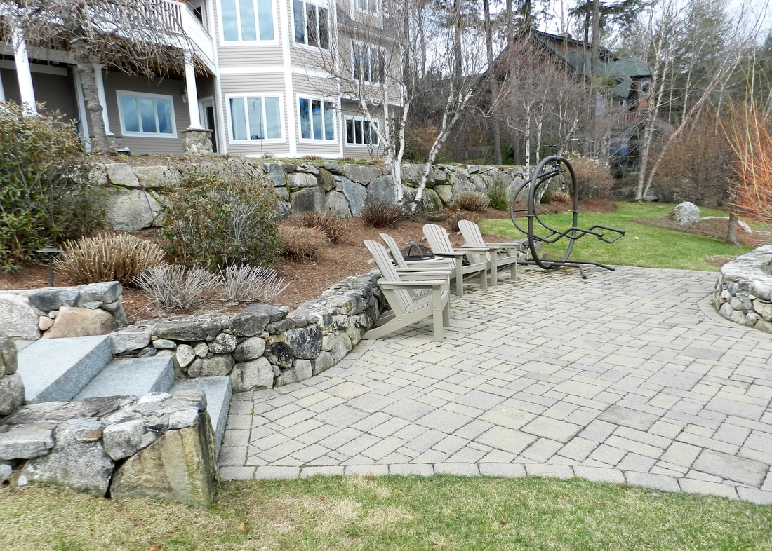 Stone steps to a paver walkway